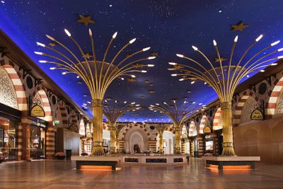 The Dubai Mall is the world's largest shopping mall based on total area and sixth largest by gross leasable area. Located in Dubai, United Arab Emirates, it is part of the 20-billion-dollar Burj Khalifa complex, and includes 1,200 shops.